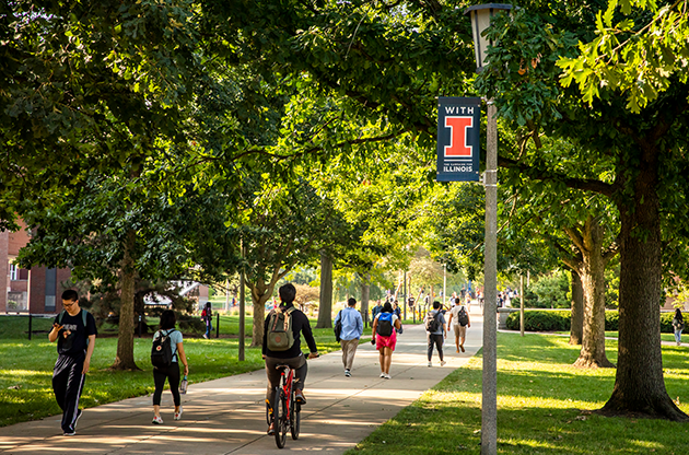 students walking on the quad at university of illinois students walking on the quad at university of illinois